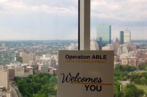 window view with the Operation ABLE Welcome sign